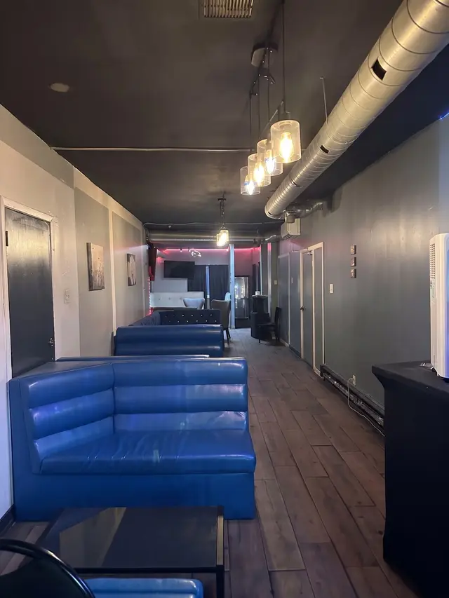 Lounge renovation, after: booth seating corridor